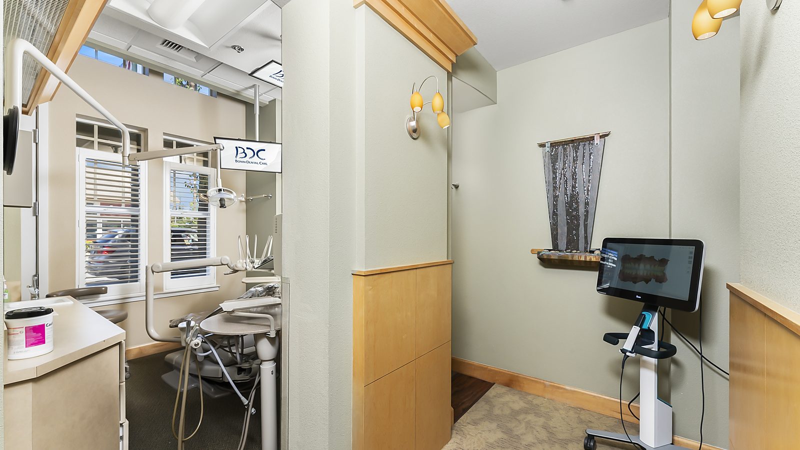 Digital scanning cart outside a treatment room at Bonin Dental Care