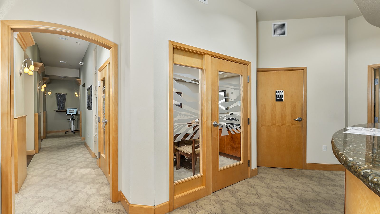 Hallway leading to treatment rooms at Bonin Dental Care